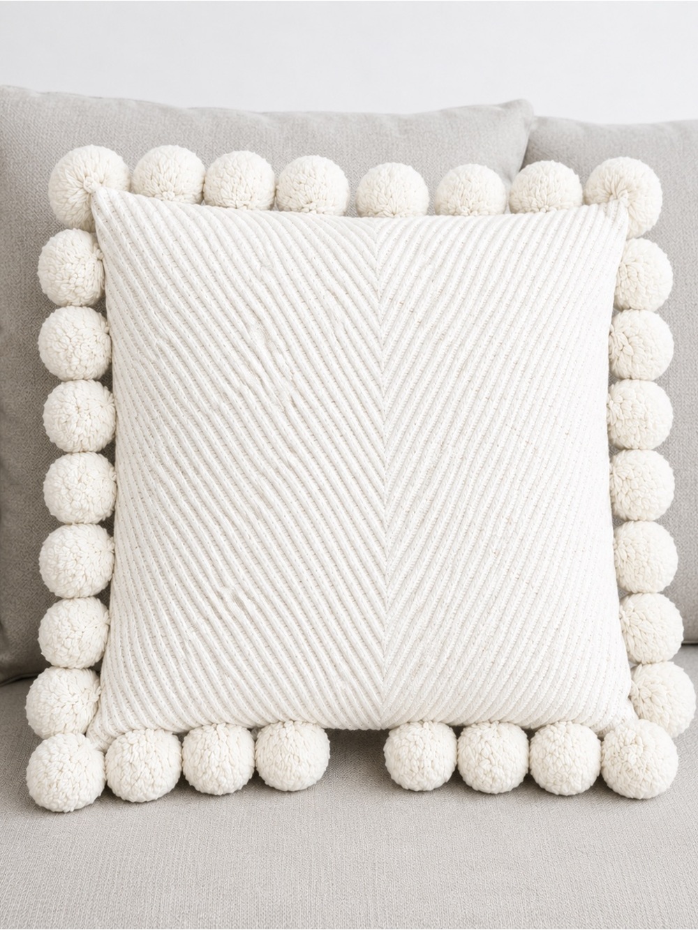 Zara Cream Accent Pillow with Pom Poms